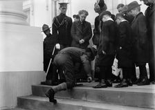 Boy Scouts - Visit of Sir Robert Baden-Powell To D.C. Making Fire; Mrs. Taft Watching, 1911. Creator: Harris & Ewing