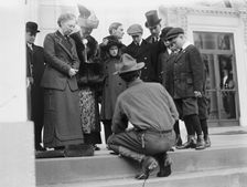 Boy Scouts - Visit of Sir Robert Baden-Powell To D.C. Making Fire; Mrs. Taft Watching, 1911. Creator: Harris & Ewing