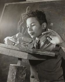 Boy sculpting, Harlem Art Center, 1939. Creator: Berenice Abbott
