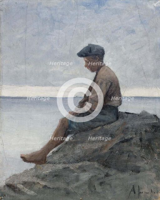 Boy sitting on rocks at the beach, 1880-1889. Creator: Amelie Lundahl.