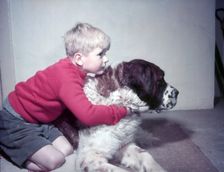 Boy with St Bernard, c1955. Creator: Arthur Charles Kirby Ware