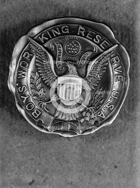 Boys Working Reserve, U.S.A. Badge, 1917. Creator: Harris & Ewing.