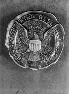 Boys Working Reserve, U.S.A. Badge, 1917. Creator: Harris & Ewing