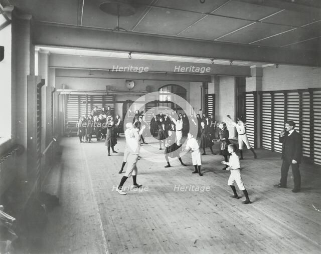 Boys and girls playing netball, Cable Street School, Stepney, London, 1908. Artist: Unknown.