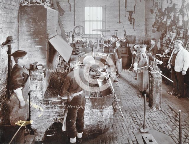 Boys at work in the smith's shop, Feltham Industrial School, London, 1908. Artist: Unknown.
