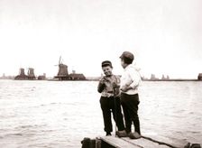Boys by a canal, Laandam, Netherlands, 1898.Artist: James Batkin