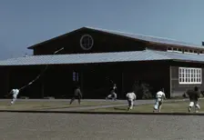 Boys flying a kite in front of community center, FSA ... camp, Robstown, Tex., 1942. Creator: Arthur Rothstein