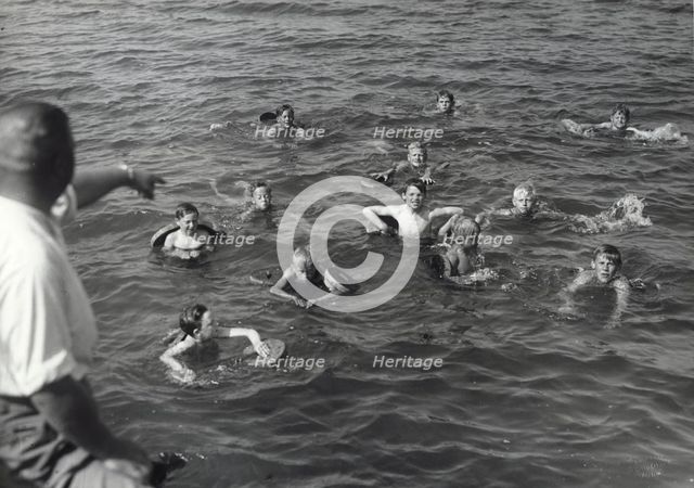 Boys having a swimming lesson, Sweden, 1939. Creator: Otto Ohm.