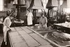 Boys making toffee in the Caley factory, Norwich, Norfolk, 1937