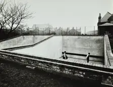 Boys playing in a fives court, Strand School, London, 1914