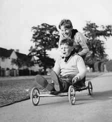 Boys playing with a home-made go-kart, Horley, Surrey, 1965