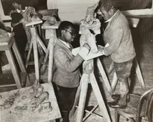 Boys sculpting a horse, Harlem Community Art Center, 1937. Creator: Solomon Horn