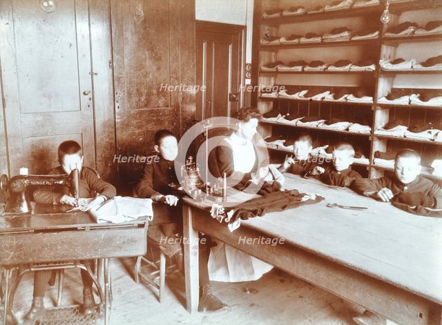 Boys sewing at the Boys Home Industrial School, London, 1900. Artist: Unknown.