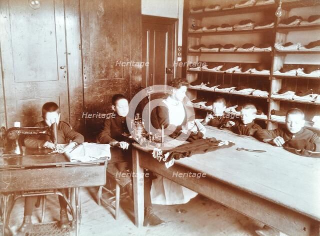 Boys sewing at the Boys Home Industrial School, London, 1900. Artist: Unknown.