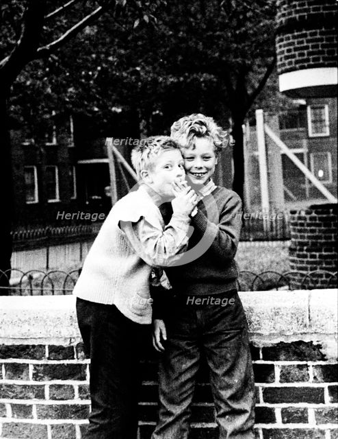 Boys smoking a cigarette, north-west London, 1967. Creator: Henry Grant.