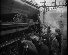 Boys Staring at a Steam Locomotive, 1931. Creator: British Pathe Ltd