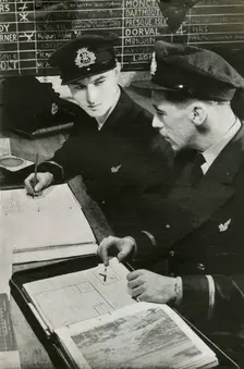 BOAC navigation officers drawing up a flight plan, World War II, c1939-c1944 (1946). Creator: Unknown