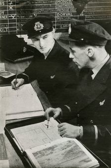 BOAC navigation officers drawing up a flight plan, World War II, c1939-c1944 (1946). Creator: Unknown
