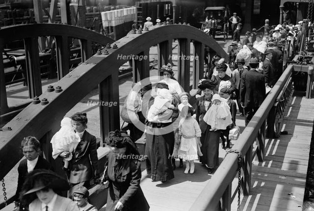 Boarding ferry for fresh air outing, 1913. Creator: Bain News Service.