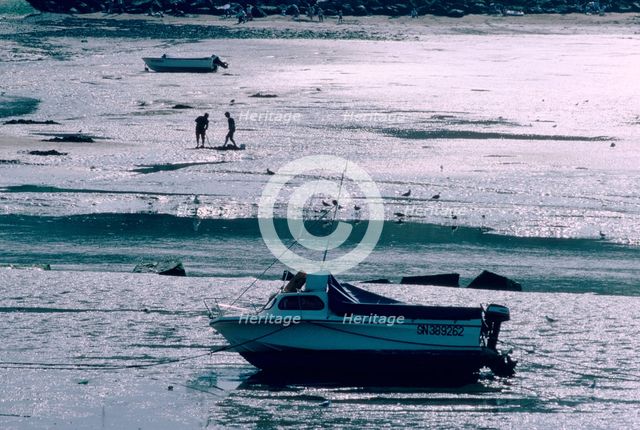 Boat at low tide, Port-en-Bessin, Normandy, France. Creator: Peter Thompson.