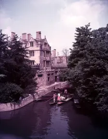 Boating on the River Cherwell and back of Magdalen College, Oxford, c1955. Creator: Arthur Charles Kirby Ware