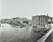Boats and warehouses on the River Thames, Lambeth, London, 1906