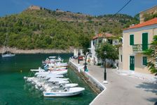 Boats at the quayside, Assos, Kefalonia, Greece. Creator: Peter Thompson