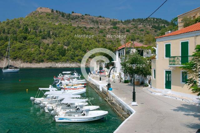 Boats at the quayside, Assos, Kefalonia, Greece. Creator: Peter Thompson.