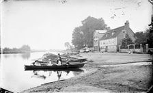 Boats moored on the River Thames near the Anglers Hotel at Walton-on-Thames, Surrey, c1860-c1922. Artist: Henry Taunt