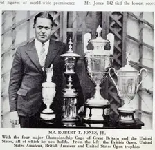 Bobby Jones (1902-72), American golfer, with Grand Slam trophies, 1930. Creator: Unknown