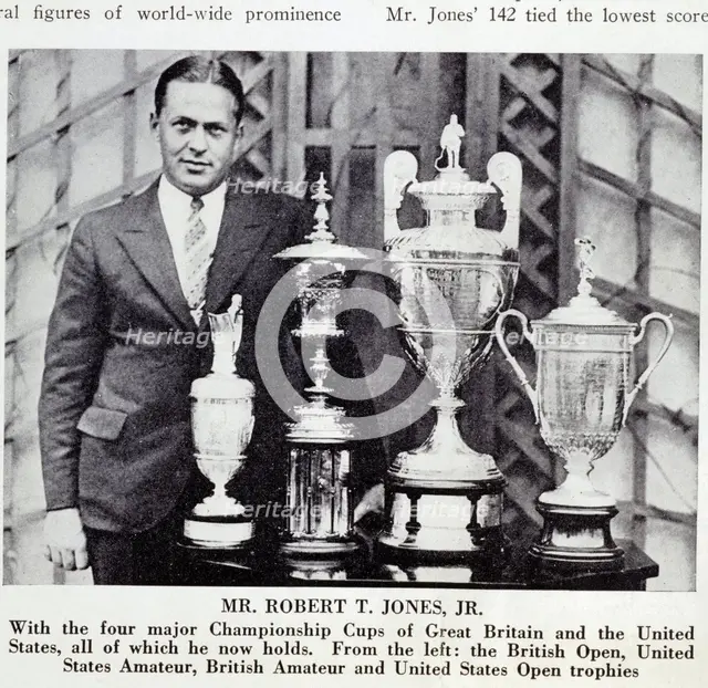 Bobby Jones (1902-72), American golfer, with Grand Slam trophies, 1930. Creator: Unknown.