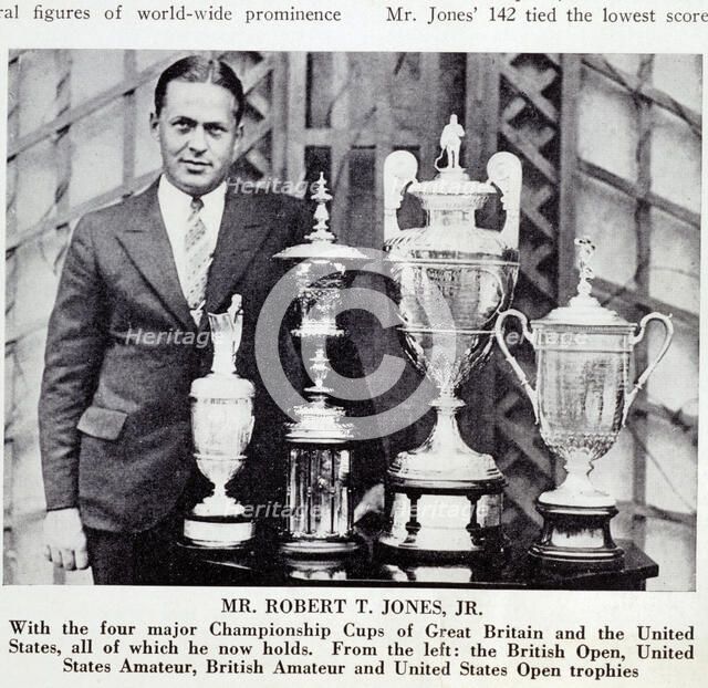 Bobby Jones (1902-72), American golfer, with Grand Slam trophies, 1930. Artist: Unknown
