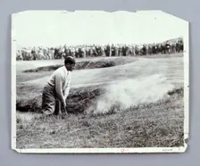 Bobby Jones playing his way out of a bunker, c1920s. Creator: Unknown