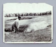 Bobby Jones playing his way out of a bunker, c1920s. Creator: Unknown