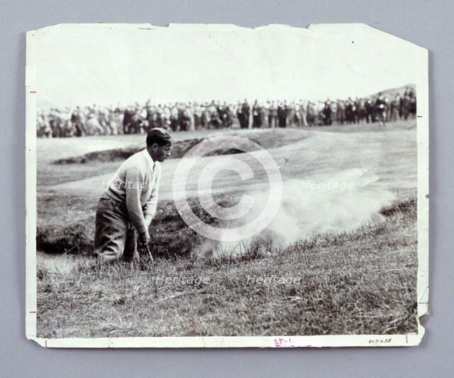 Bobby Jones playing his way out of a bunker, c1920s. Artist: Unknown