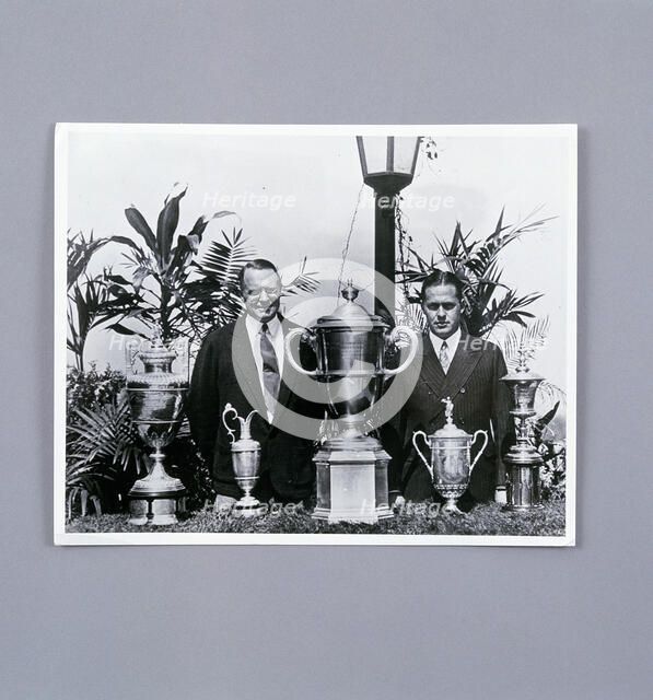 Bobby Jones with Grand Slam trophies, c1930. Artist: Unknown