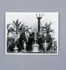 Bobby Jones with Grand Slam trophies, c1930. Creator: Unknown