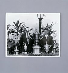 Bobby Jones with Grand Slam trophies, c1930. Creator: Unknown