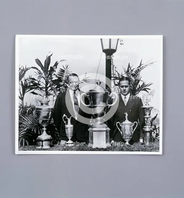 Bobby Jones with Grand Slam trophies, c1930. Creator: Unknown.