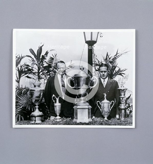 Bobby Jones with Grand Slam trophies, c1930. Creator: Unknown.