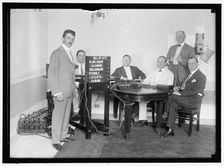 Bobroff voting machine being considered for use in house, between 1910 and 1917. Creator: Harris & Ewing