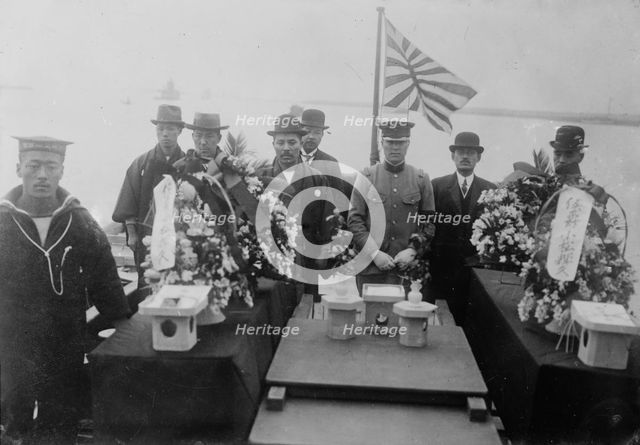 Bodies of Japanese Navy aviators killed by a fall, on torpedo boat, between c1915 and c1920. Creator: Bain News Service.