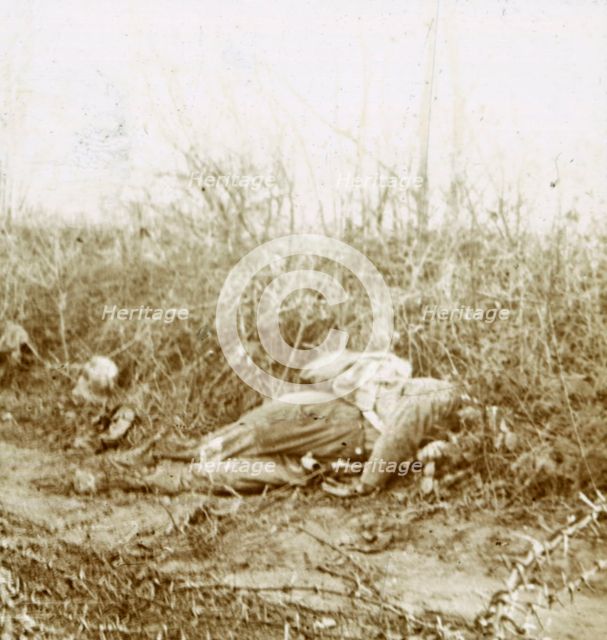 Body of dead soldier, Château-Porcien, northern France, c1914-c1918. Artist: Unknown.