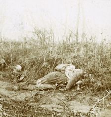 Body of dead soldier, Château-Porcien, northern France, c1914-c1918