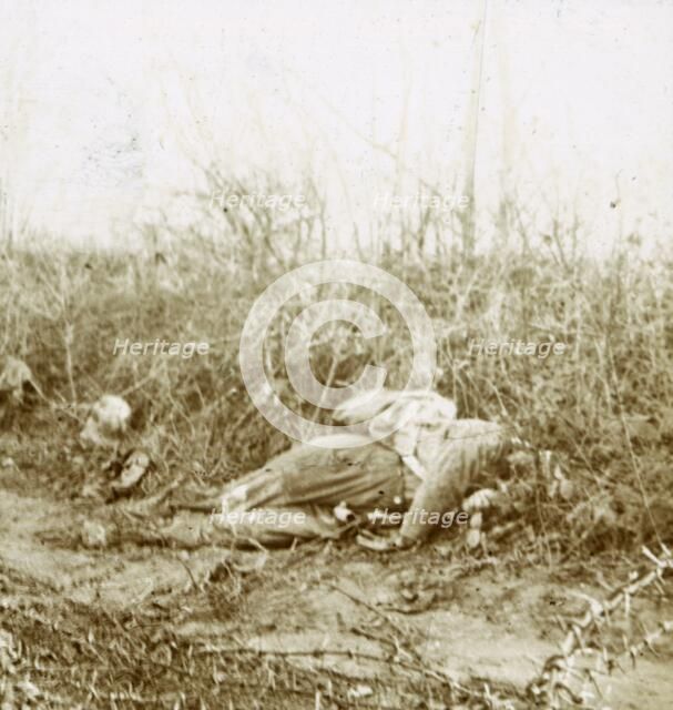 Body of dead soldier, Château-Porcien, northern France, c1914-c1918. Artist: Unknown.