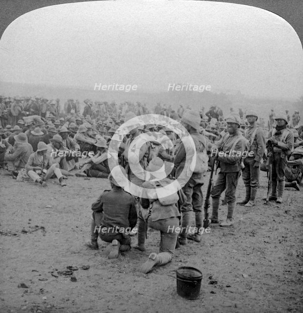 Boer prisoners resting on the road from Paardeberg to Modder River, South Africa, 1900-1902.Artist: Underwood & Underwood