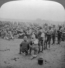 Boer prisoners resting on the road from Paardeberg to Modder River, South Africa, 1900-1902.Artist: Underwood & Underwood