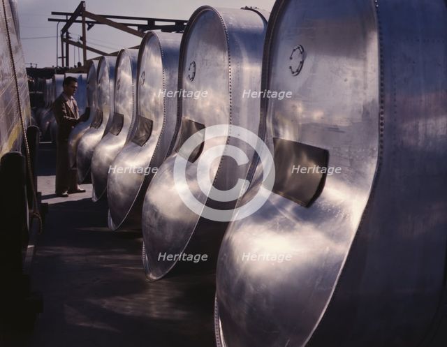 Bomb bay gasoline tanks for long flights...North American Aviation, Inc., Inglewood, Calif. , 1942. Creator: Alfred T Palmer.