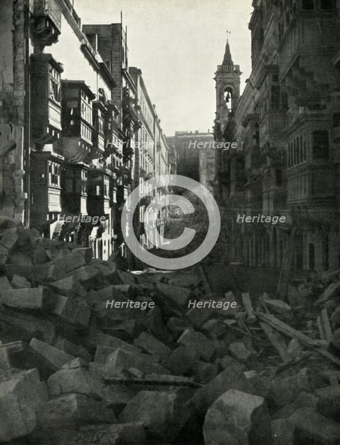 Bomb damage on a Maltese street, World War II, 1942 (1944). Creator: Unknown.