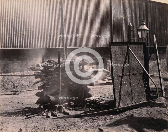 Bombay (Mumbai): a body burning on a funeral pyre, (1900?). Creator: Unknown.